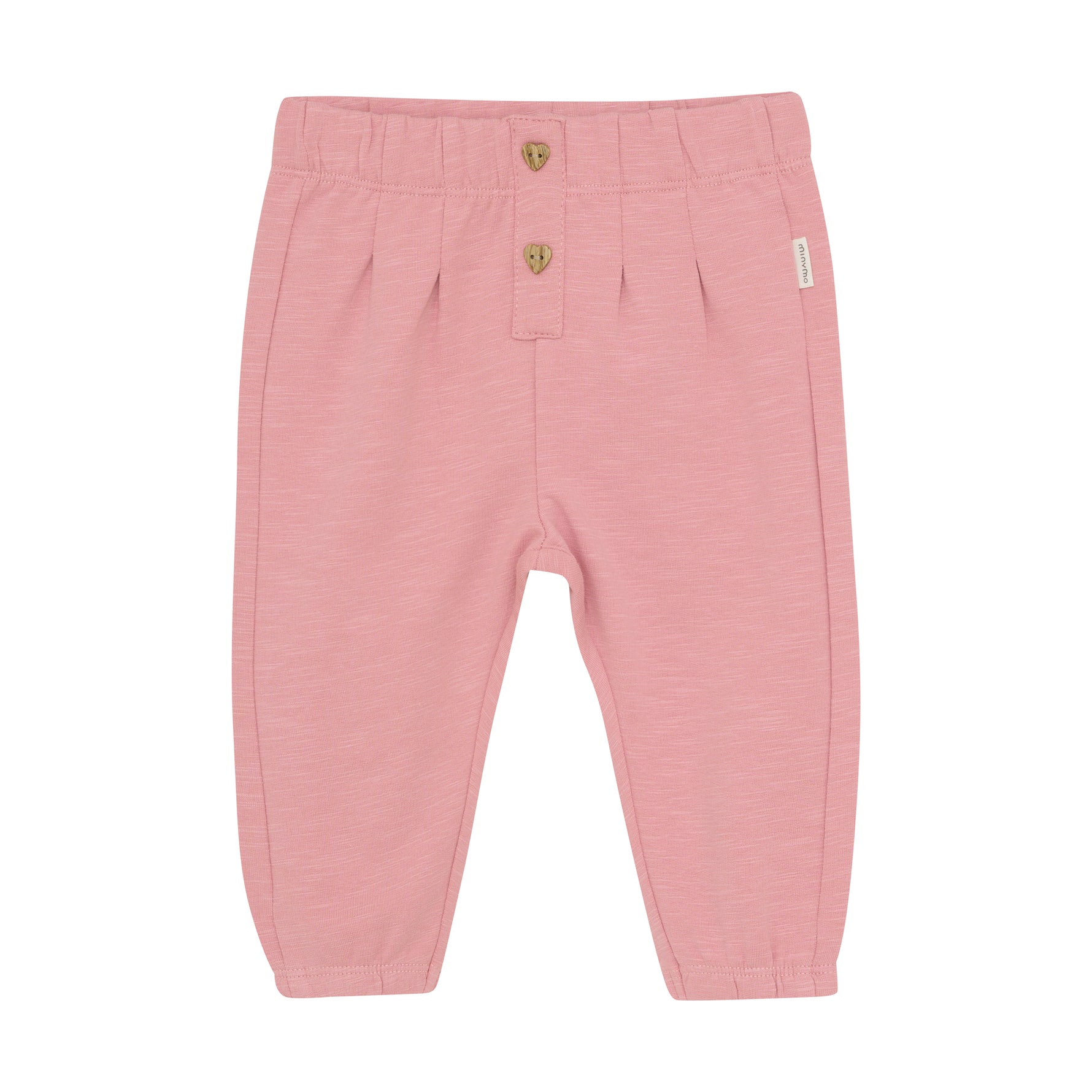 Diese rosa Sweatpants von MINYMO bestechen durch ihre charmanten, herzförmigen Knöpfe und bieten zugleich hohen Tragekomfort für jeden Tag.