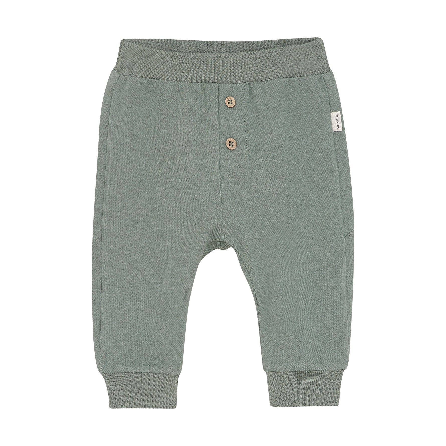Entdecken Sie die bequemen Sweatpants von MINYMO, verziert mit einem auffälligen Dinosaurier-Motiv – perfekt für stilbewusste Kids, die Komfort und Spaß lieben. 