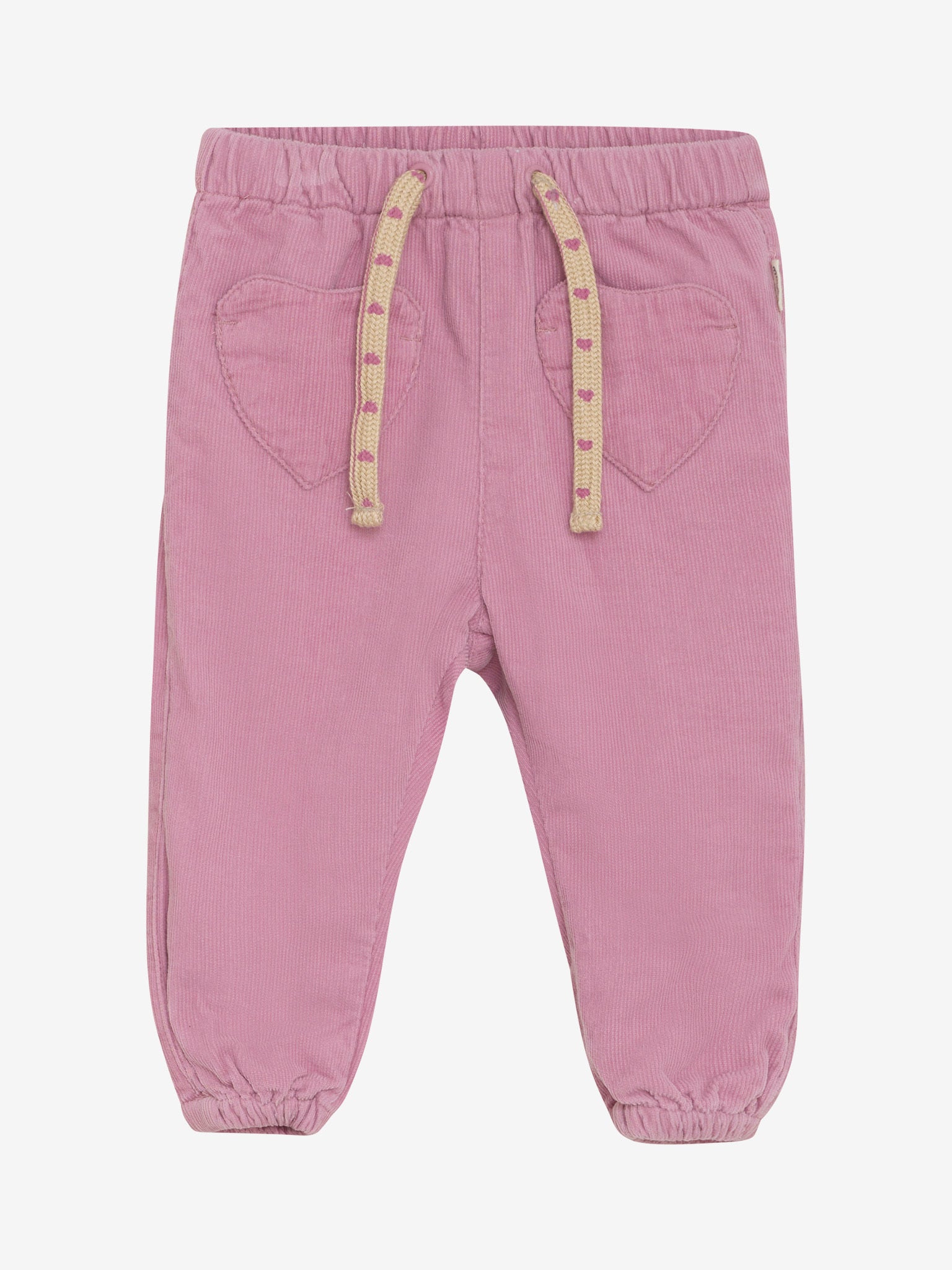 Diese rosa Cordhose von MINYMO begeistert mit süßen Herztaschen und verspielten, herzbedruckten Bändern – perfekt für kleine Entdeckerinnen mit Stil!