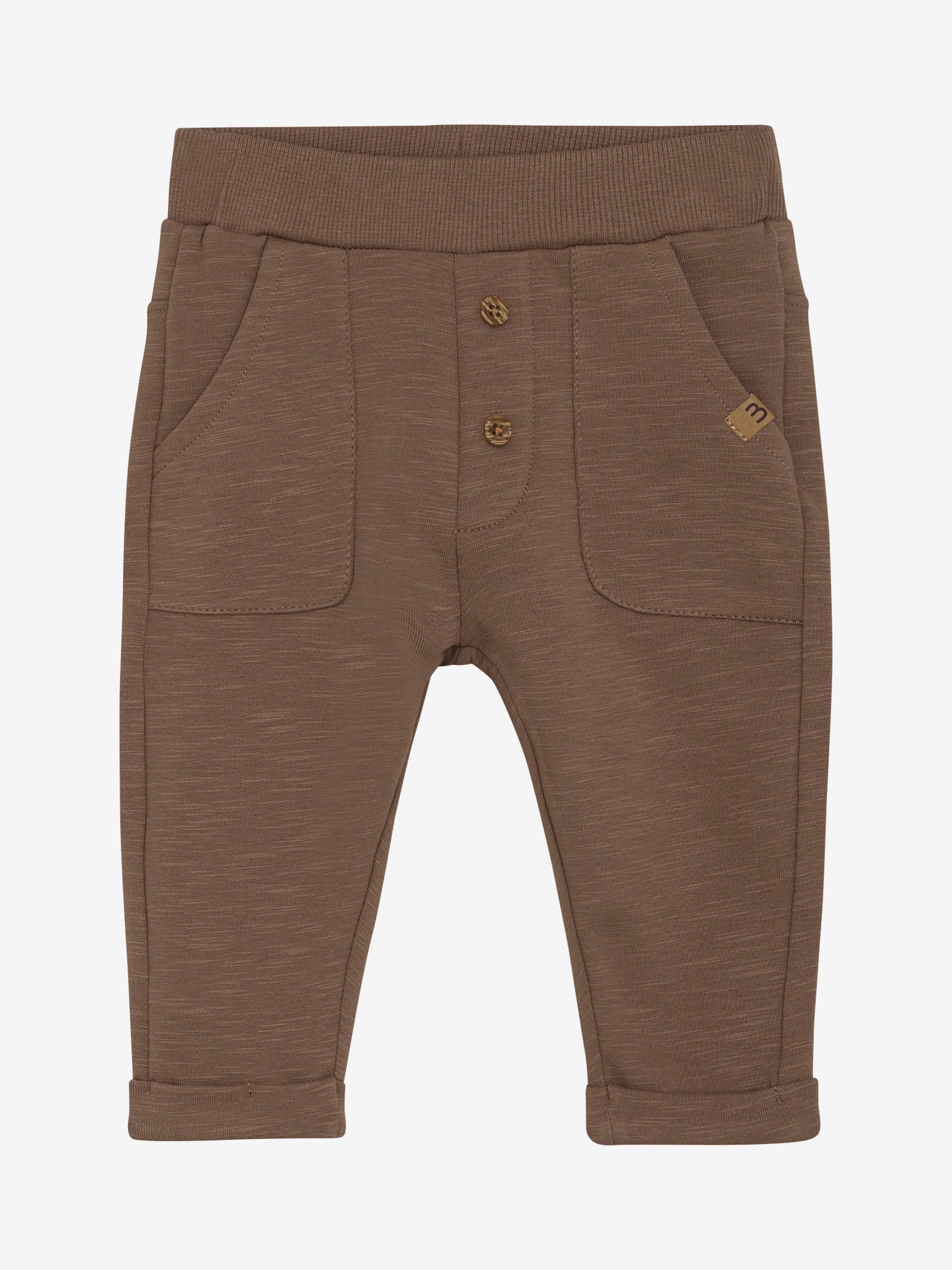 Diese braunen Sweatpants von MINYMO sind mit süßen kleinen Knöpfen versehen und verleihen jedem Outfit eine verspielte Note.