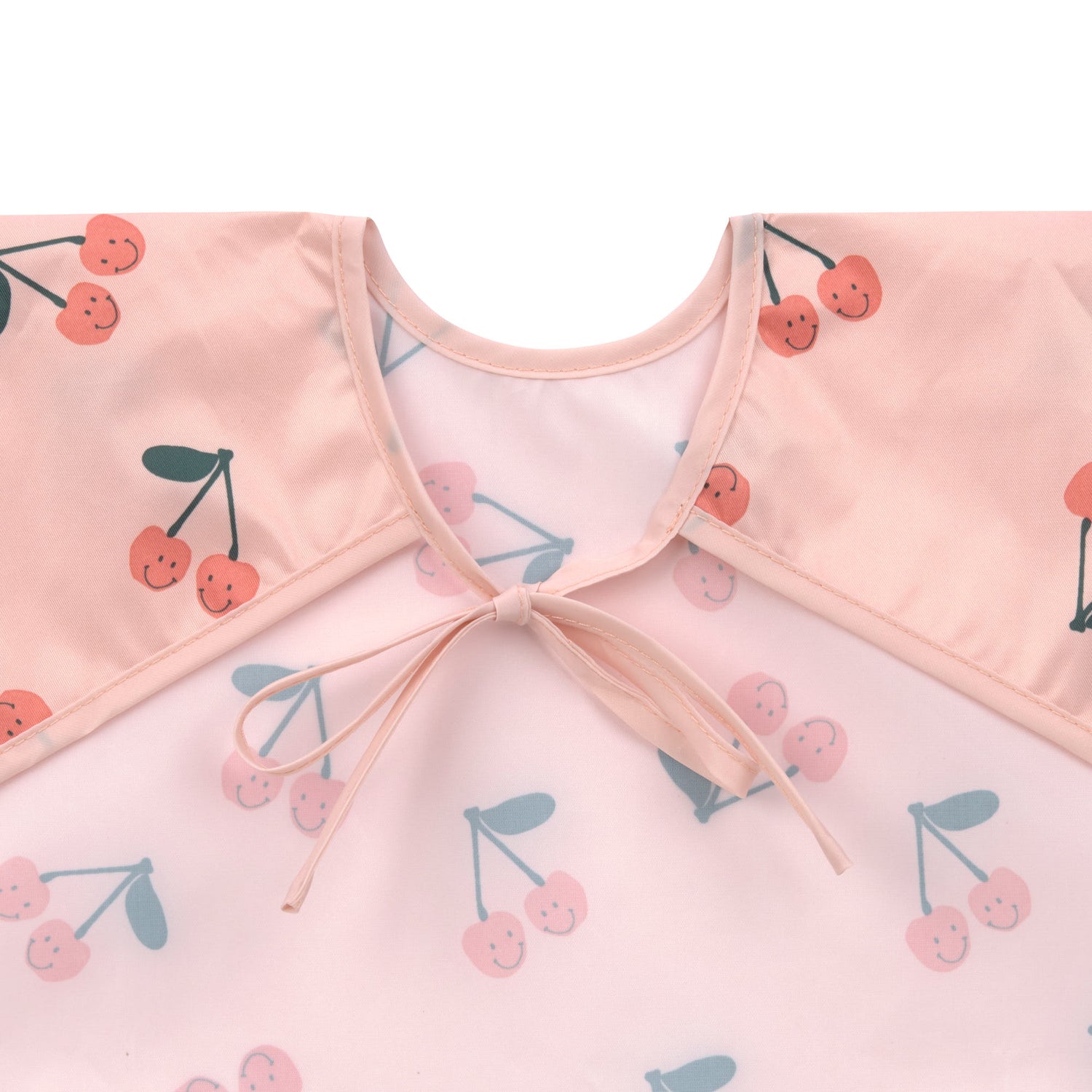 Die zwei langärmeligen Ärmellätzchen im fröhlichen Kirschen-Design von Lässig schützen Kleidung zuverlässig beim Essen, Malen und Basteln. Sie sind wasserdicht, verstellbar und leicht – perfekt für Kinder von 6 bis 24 Monaten. Einfach zu reinigen und bequem zu tragen.