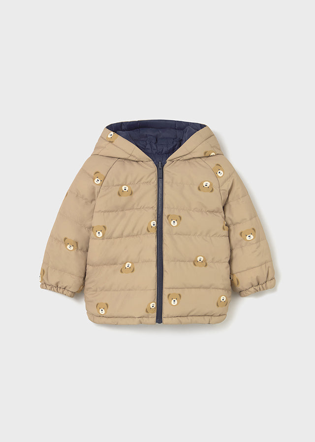 Weiche Wendejacke von Mayoral in stilvollem Dunkelblau und Beige, die vielseitigen Komfort und moderne Eleganz bietet.
