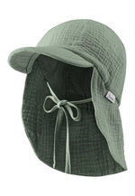 Diese Schirmmütze aus grünem Musselin bietet optimalen Schutz und ein angenehmes Tragegefühl.