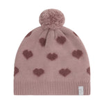 Weiche Teddy-Pile-Haube von Minymo in zartem Rosa mit niedlichem Herzmuster. Angenehm zu tragen und perfekt für kühle Tage. Aus hochwertiger Materialmischung: 52% Viscose, 28% Polyester und 20% Nylon für optimalen Komfort und Langlebigkeit.