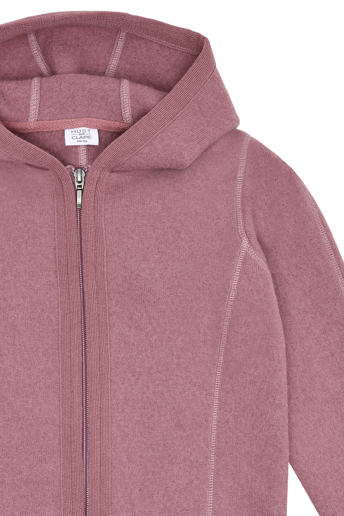 Die rosa Wolljacke von Hust & Claire sorgt für wohlige Wärme und ein angenehmes Tragegefühl.