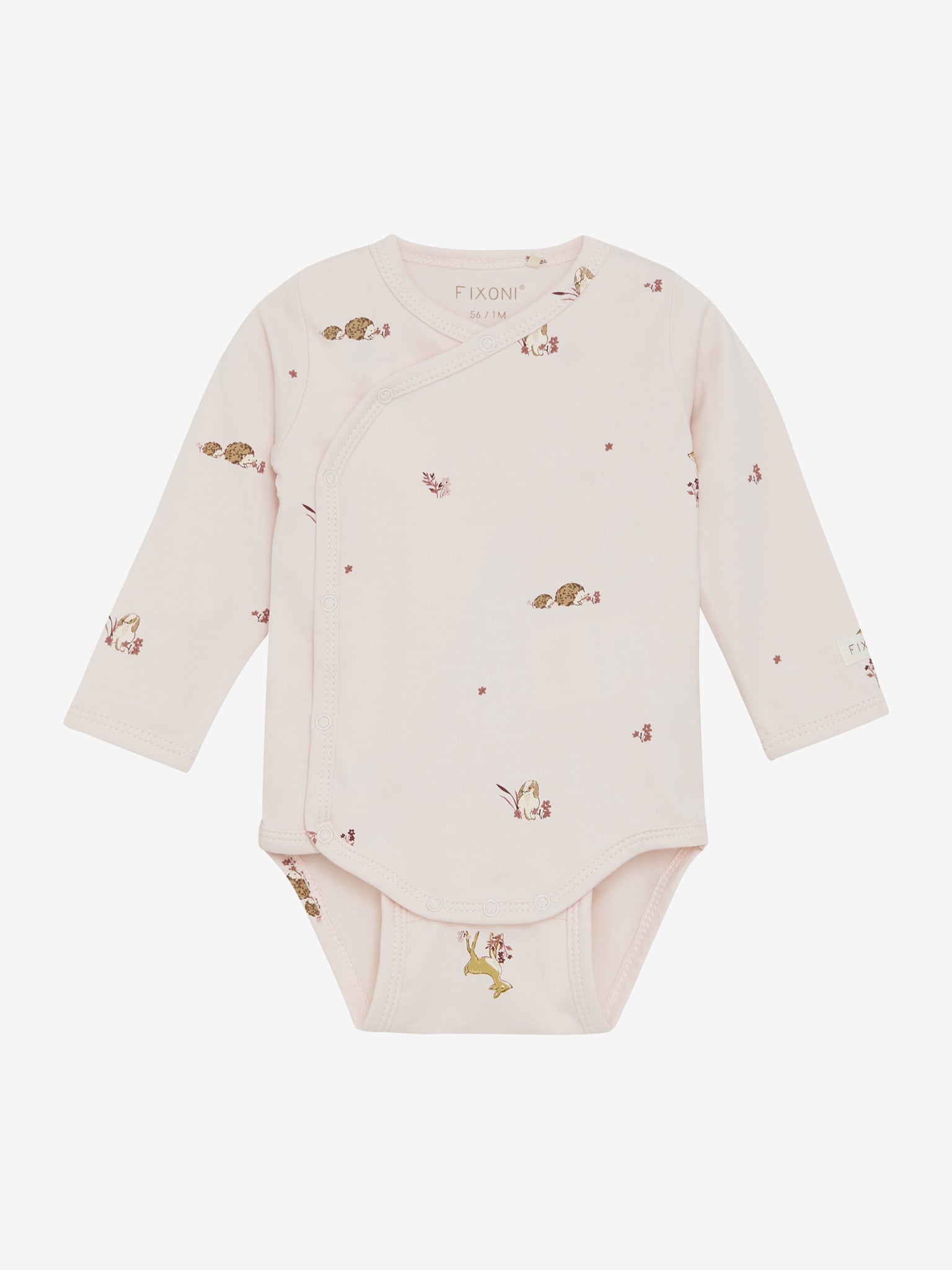 Der langärmelige Wickelbody von Fixoni mit charmantem Igelmotiv bietet Ihrem Baby nicht nur Komfort, sondern auch stilvolle Wärme – perfekt für jeden Tag.