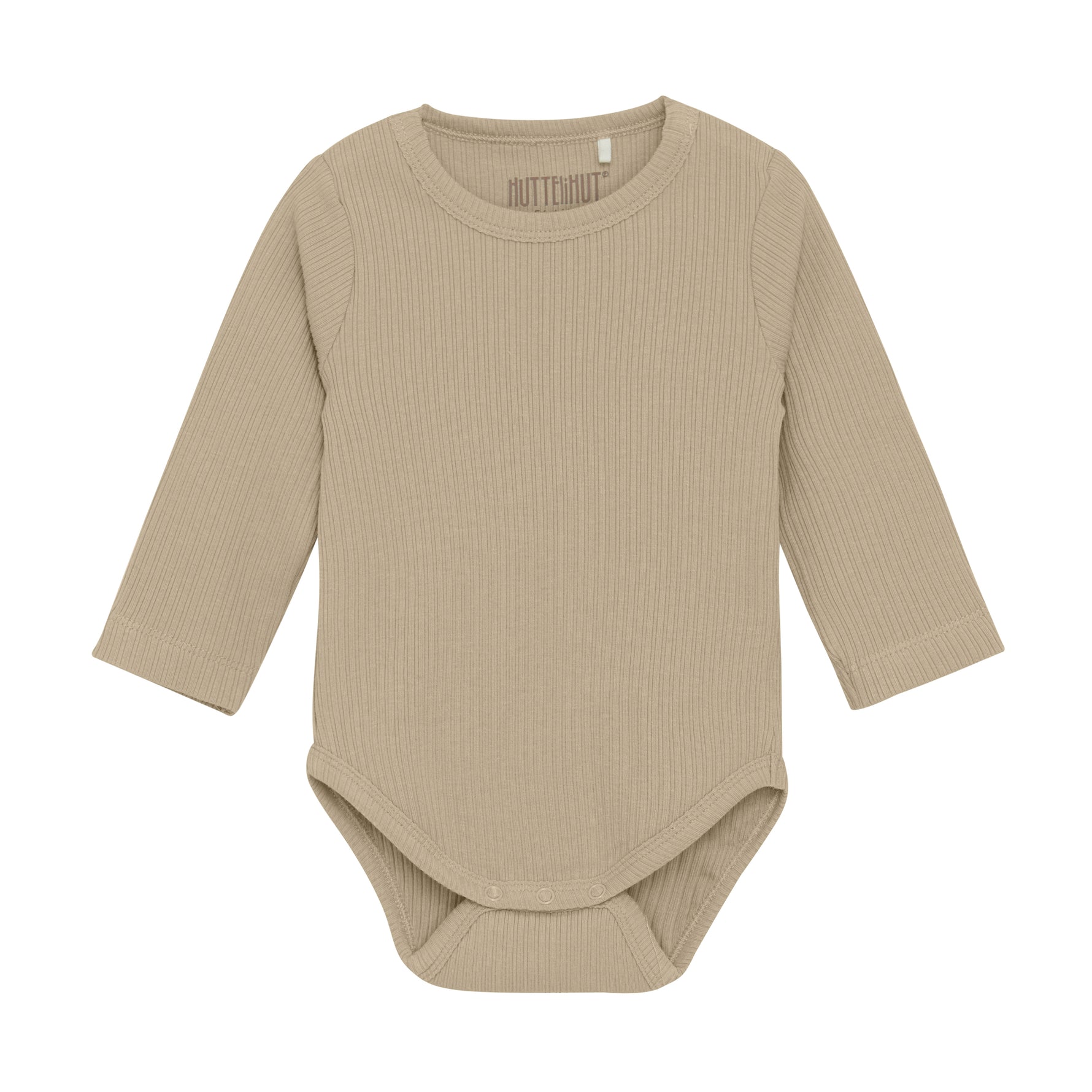 Beschreibung
Süßer einfarbiger Ripp-Bodysuit von HUTTEliHUT. Der Bodysuit hat lange Ärmel und wird mit Druckknöpfen an der Schulter und zwischen den Beinen geschlossen. Hergestellt aus einer unglaublich weichen Qualität.