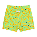 Grüne Badeshorts mit All-Over lustigem Bananenprint von Color Kids.