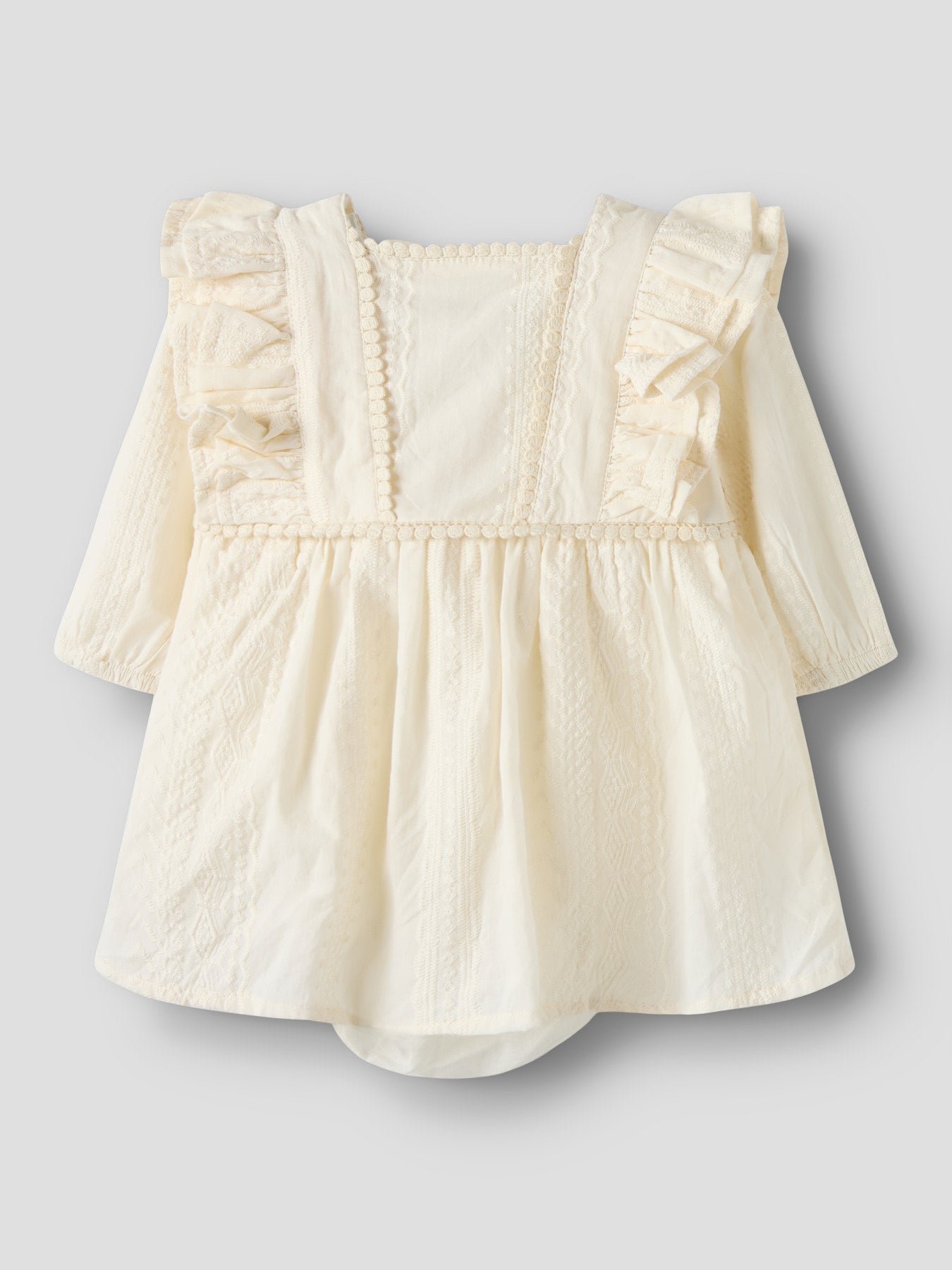 Das Kleid von Lil'Ateilier vereint auf harmonische Weise Schönheit und elegante Raffinesse.