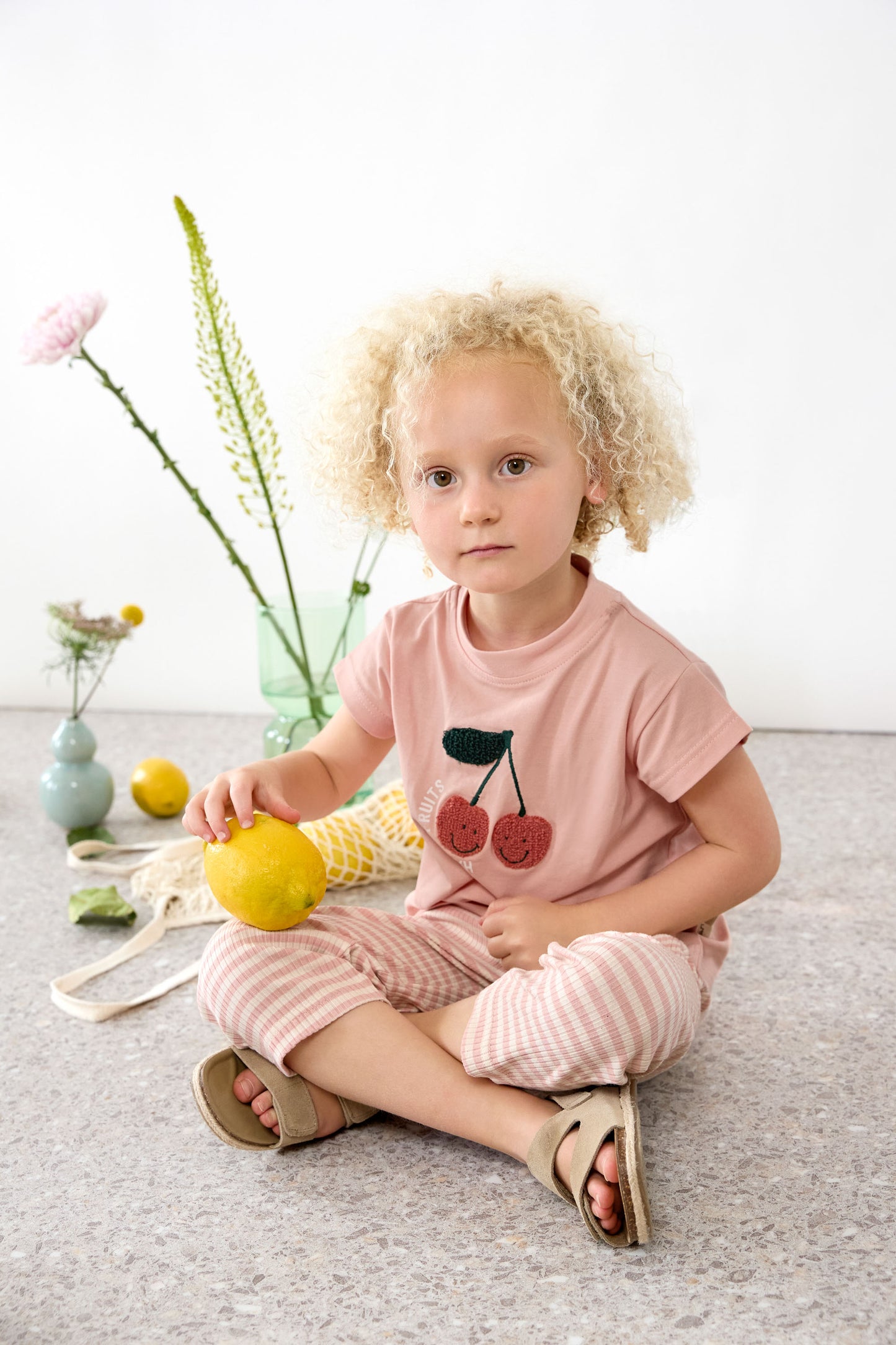 Das stylishe Kinder Shirt in Peach macht das Outfit der Kids zum Hingucker! Das GOTS-zertifizierte Kurzarm Shirt aus Baumwolle (bio) rundet in modischen Farben und auffälligen Aufdrucken jeden Look ab. Bis Größe 86/92: Druckknöpfe an der Schulter.