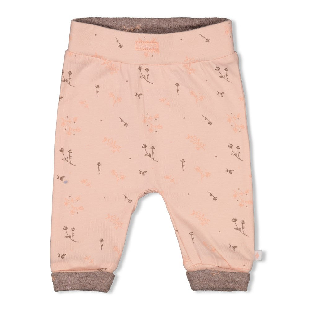 rosa Hose mit dezentem Blumendruck