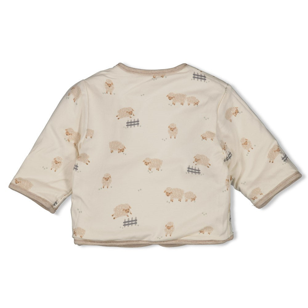 Diese beige Wendejacke aus der Sleepy Sheepy Kollektion von Feetje besticht durch ein charmantes Schafsmotiv auf einer Seite und bietet vielseitigen Stil für jeden Tag.