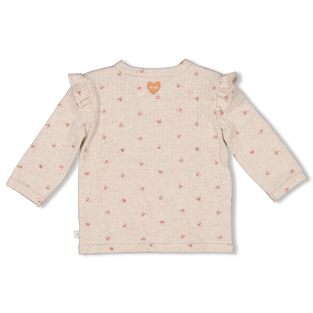 Dieses gerippte Langarmshirt mit zarten Blumenakzenten stammt aus der Morning Sun Kollektion von Feetje und verbindet Komfort mit einem verspielten Design.