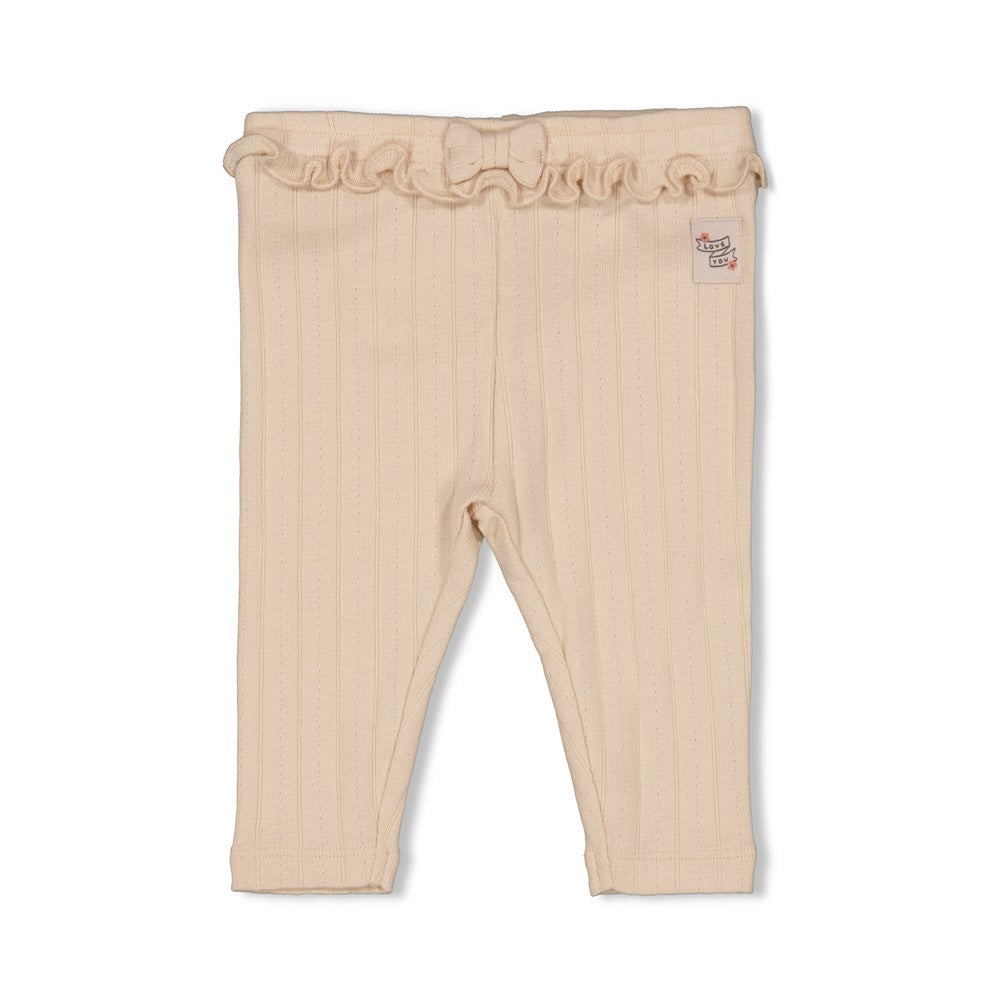 Diese gerippten Leggings aus der Woodland Bloom Kollektion von Feetje überzeugen mit einem elastischen Bund, verziert mit Rüschen und einem charmanten Schleifendetail.