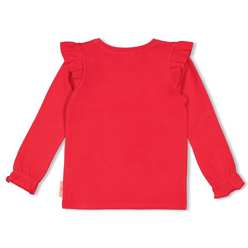 Dieses rote Langarmshirt aus der Queen Of Hearts Kollektion von Jubel besticht durch ein kleines Herzmotiv und verspielte Rüschen an den Ärmeln. Es verbindet Komfort mit einem charmanten Design, das jeden Tag verschönert.