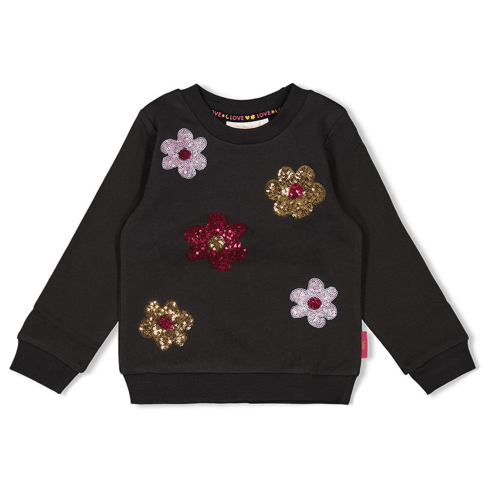 Dieser Sweater von Jubel besticht durch ein florales Muster aus funkelnden Pailletten.