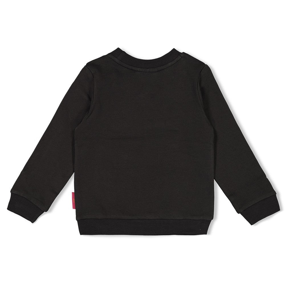 Dieser Sweater von Jubel besticht durch ein florales Muster aus funkelnden Pailletten.