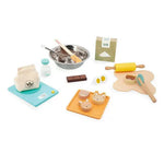 Beschreibung
Oh, was für ein Duft strömt da aus der Miniküche der Kinder! Für kleine Feinschmecker, die gerne in mit dem Geschirr spielen, gibt es nichts Besseres als dieses Holzzubehör zum Backen wie die Großen! In diesem kleinen Atelier findet sich alles, was es braucht, um der Fantasie freien Lauf zu lassen und renommierter Konditor zu spielen!