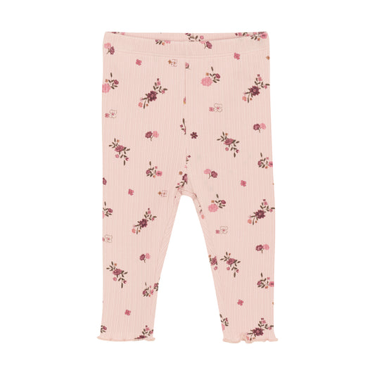 Diese Leggings vereinen Komfort und Stil mit ihrem einzigartigen Blumenmuster und dem gerippten Design. Die perfekte Wahl für jeden Tag. Durch das weiche Material bieten sie eine optimale Passform und Bewegungsfreiheit. Eine elegante Ergänzung zu jeder Garderobe.