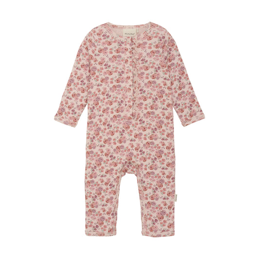 Eleganter rosa Body von MINYMO, verziert mit einem feinen Blumendesign, das zeitlose Schönheit ausstrahlt.