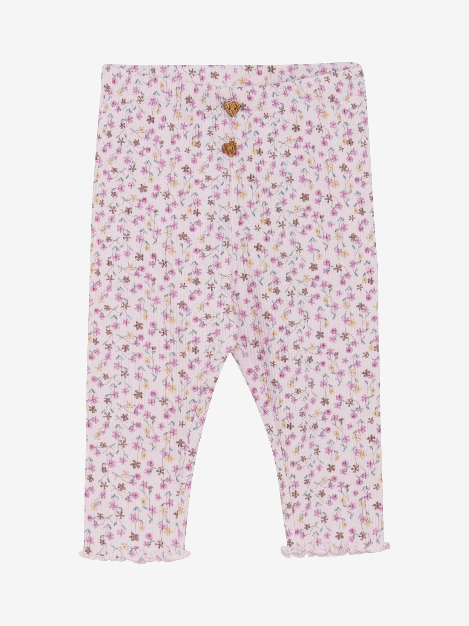 Diese gerippte Leggings von MINYMO begeistert mit einem verspielten Allover-Blumenmuster und süßen kleinen Knöpfen – perfekt für einen fröhlichen Look.