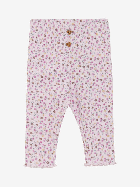 Diese gerippte Leggings von MINYMO begeistert mit einem verspielten Allover-Blumenmuster und süßen kleinen Knöpfen – perfekt für einen fröhlichen Look.