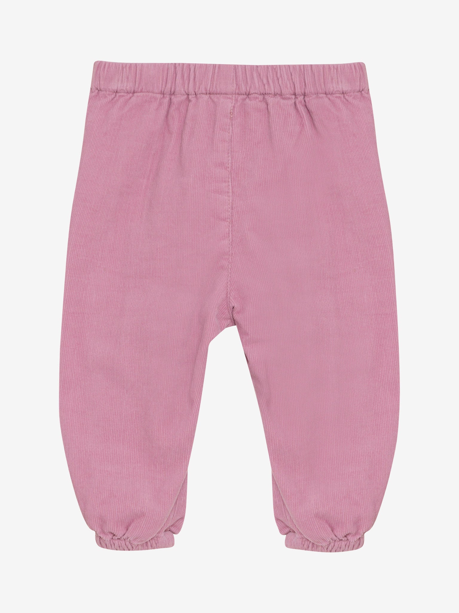 Diese rosa Cordhose von MINYMO begeistert mit süßen Herztaschen und verspielten, herzbedruckten Bändern – perfekt für kleine Entdeckerinnen mit Stil!