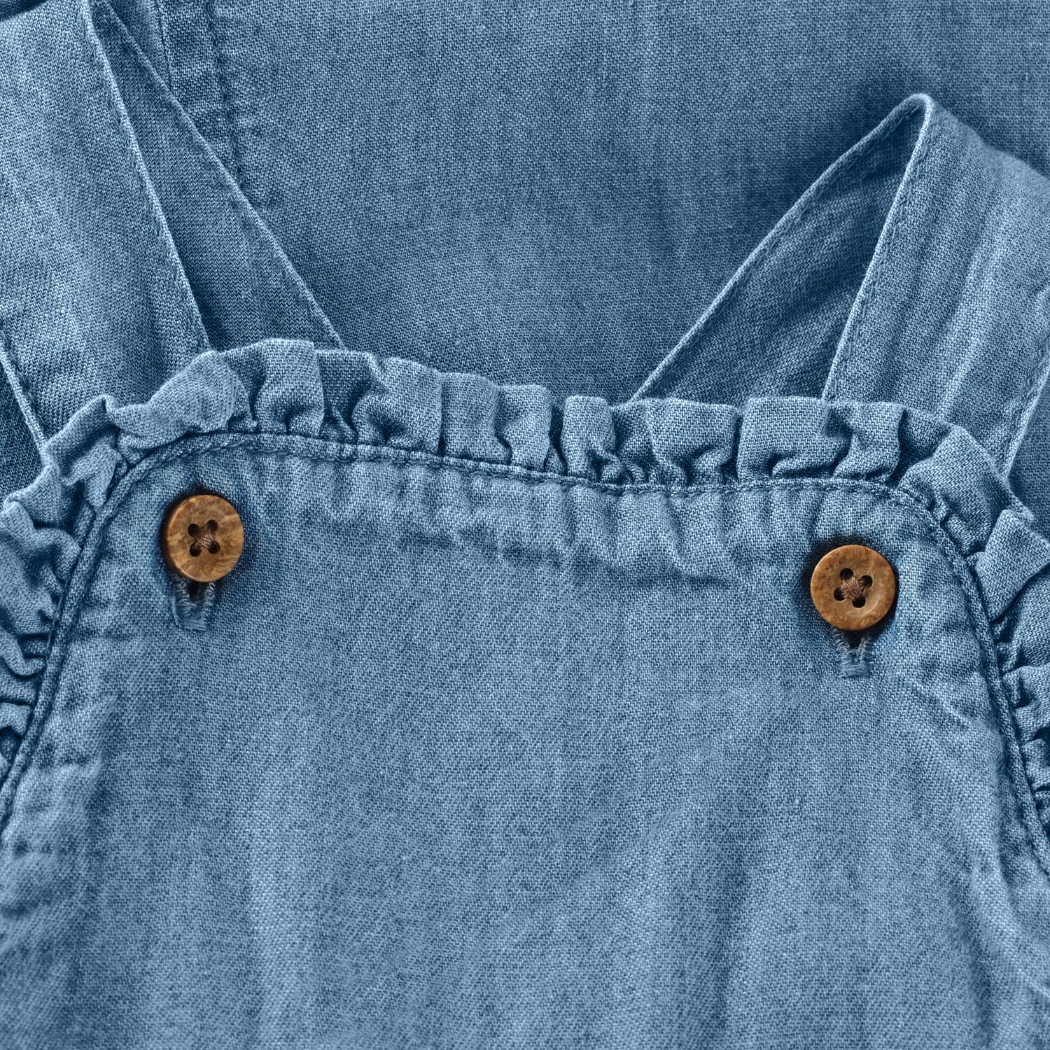 Blauer Overall mit Rüschendetails von MINYMO.