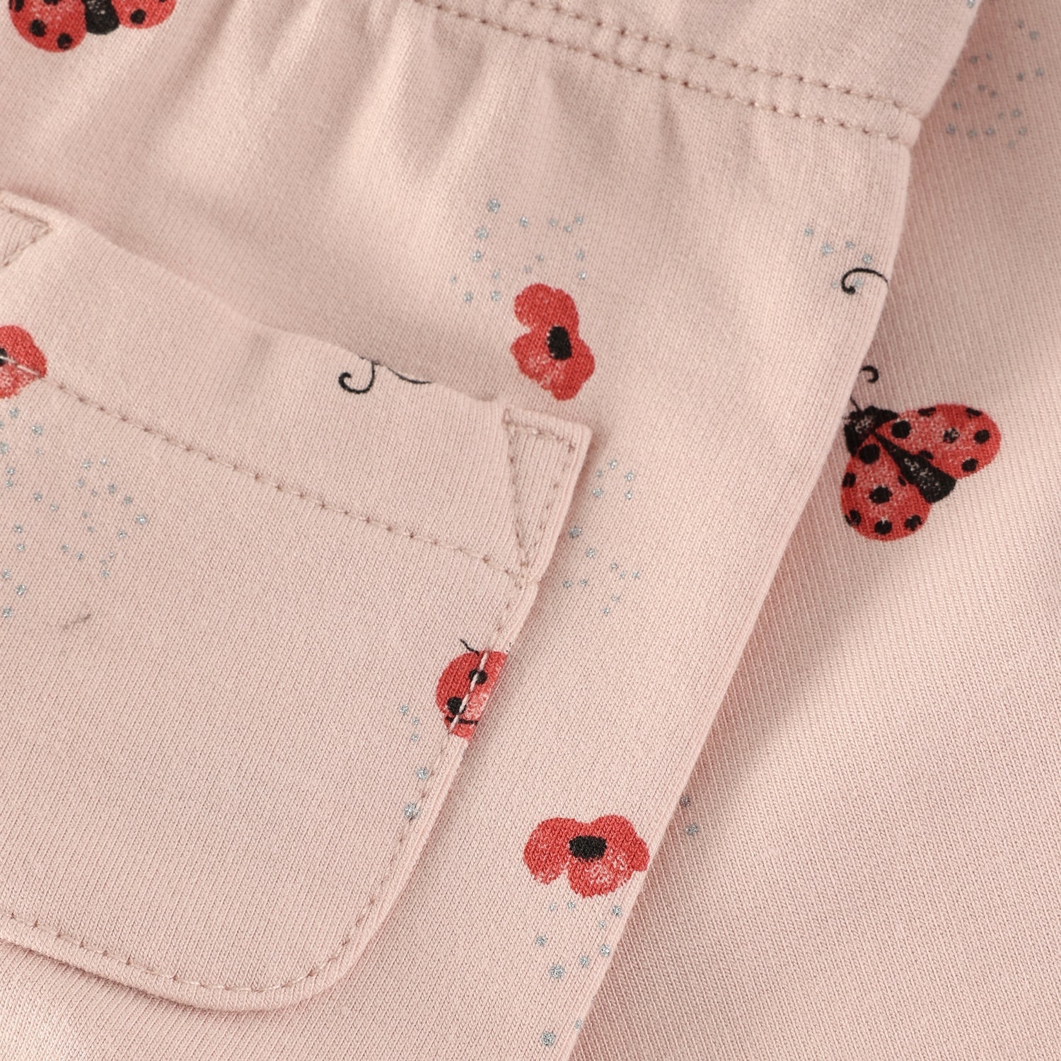 Rosa Sweatpants mit Marienkäfer All Over Print von MINYMO.