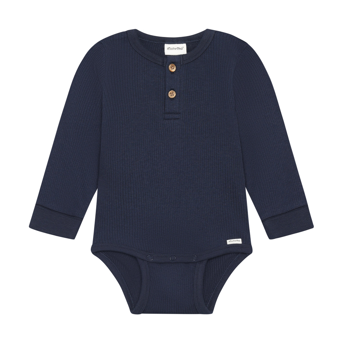 Ein eleganter langarm Rib Body in dunklem Blau von Minymo – perfekt für vielseitige Styling-Möglichkeiten. Die hochwertige Materialmischung aus Modal, Baumwolle und Elastane bietet optimalen Komfort und Bewegungsfreiheit für den Alltag.