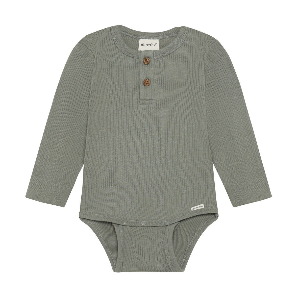 Ein eleganter langärmeliger Rib Body in Grün von Minymo. Die hochwertige Mischung aus Modal, Baumwolle und Elastane bietet optimalen Komfort und Bewegungsfreiheit. Perfekt für vielseitige Styling-Möglichkeiten im Alltag.