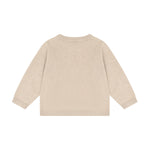 Gemütlicher beiger Knit Cardigan von Minymo mit niedlichen Hunde Motiven – perfekt für kleine Tierfreunde, die es kuschelig lieben.