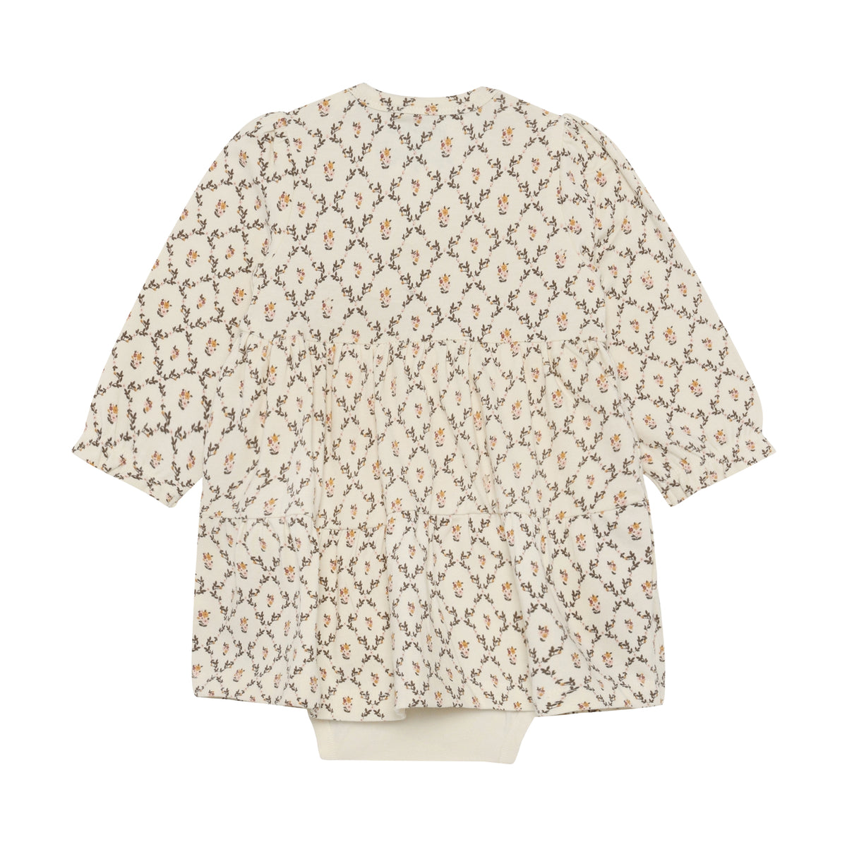 Elegantes Langarm-Body-Kleid mit charmanten Blumenmuster – perfekt für jeden Tag. Das hochwertige Material aus 95% Baumwolle und 5% Elastane bietet optimalen Komfort und Bewegungsfreiheit. Von Minymo, bekannt für qualitativ hochwertige Kindermode.