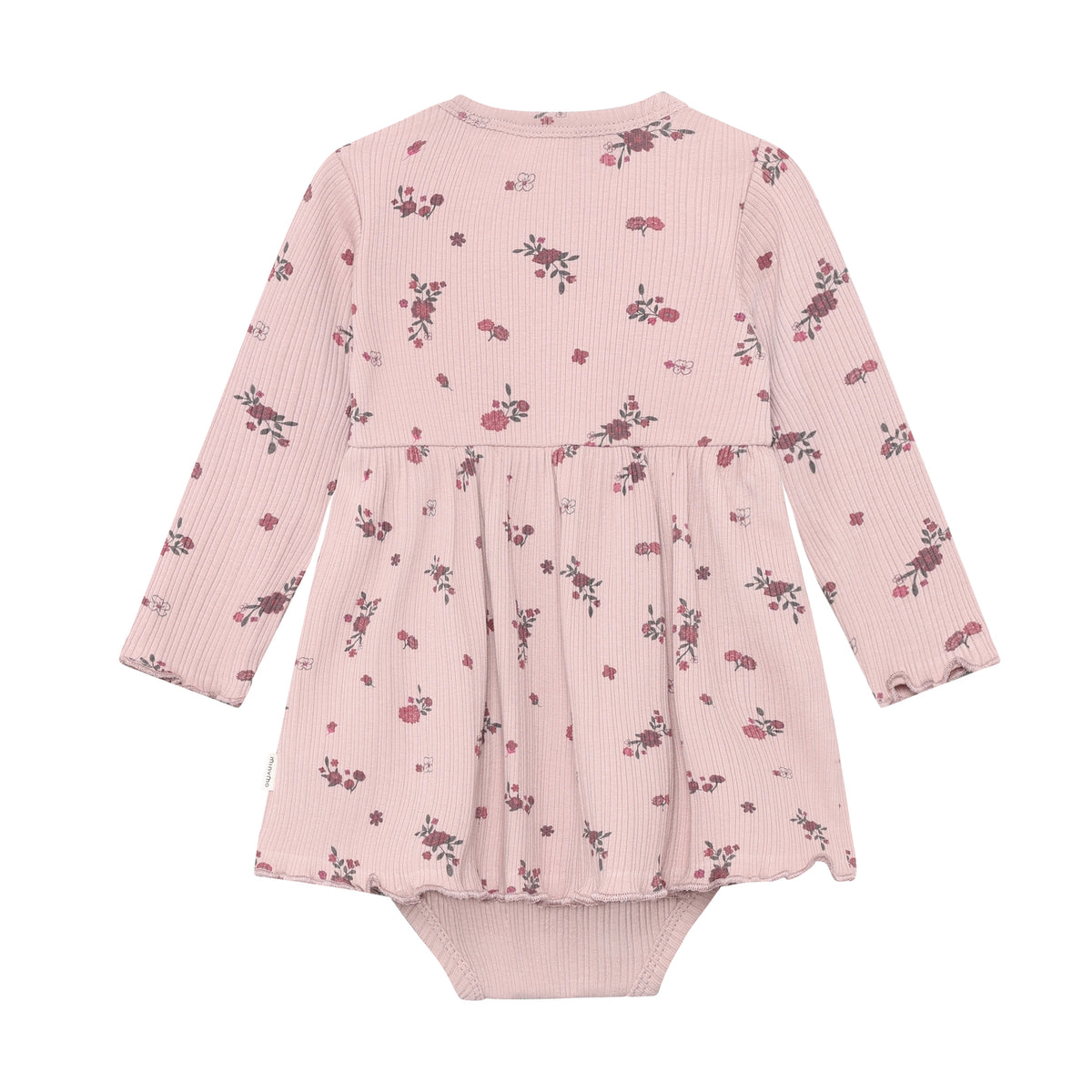 Ein weiches Body Kleid mit langen Ärmeln und zarten Blumenmustern – perfekt für jeden Tag. Die Mischung aus Baumwolle und Elastane sorgt für Komfort und Bewegungsfreiheit.