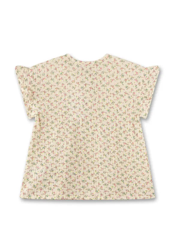 Diese beige Bluse von Sanetta besticht durch ihr zartes Blumenmuster und verleiht jedem Outfit eine feminine Note.