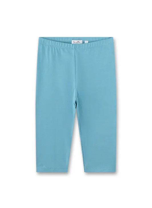 Entdecken Sie die blauen Capri-Leggings von Sanetta – perfekt für stilbewusste Frauen, die Komfort und Eleganz verbinden möchten.