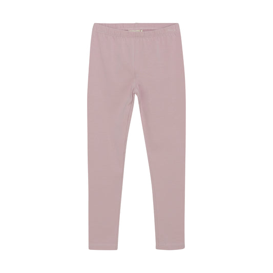 Entdecken Sie die auffälligen Leggings in leuchtendem Lila von MINYMO, die Ihrem Outfit einen frischen und lebendigen Akzent verleihen.