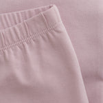 Entdecken Sie die auffälligen Leggings in leuchtendem Lila von MINYMO, die Ihrem Outfit einen frischen und lebendigen Akzent verleihen.