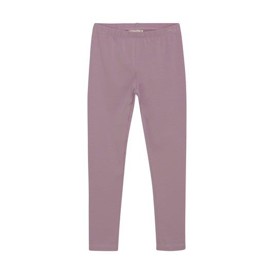 Entdecken Sie die lila Leggings von MINYMO – perfekt für stilbewusste Mädchen, die Komfort und trendiges Design schätzen.