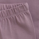 Entdecken Sie die lila Leggings von MINYMO – perfekt für stilbewusste Mädchen, die Komfort und trendiges Design schätzen.