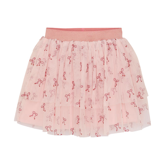 Der rosa Rock von MINYMO begeistert mit funkelnden Schleifen und verleiht jedem Look eine besondere Note.