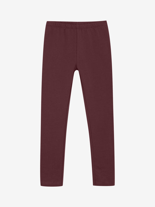 Diese dunkelroten Leggings von MINYMO bieten einen hohen Tragekomfort und sind die perfekte Wahl für stilbewusste Mädchen, die Wert auf Bequemlichkeit legen.