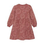 Dieses rosa Kleid von MINYMO ist mit einem fröhlichen Smiley-Motiv versehen und sorgt für gute Laune.