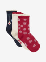 Dieses 3er-Pack Socken von MINYMO umfasst ein rotes Paar mit Schneeflocken, ein dunkelblaues mit festlichem Weihnachtsmotiv und ein weißes Paar – perfekt, um stilvoll durch die Winterzeit zu gehen.