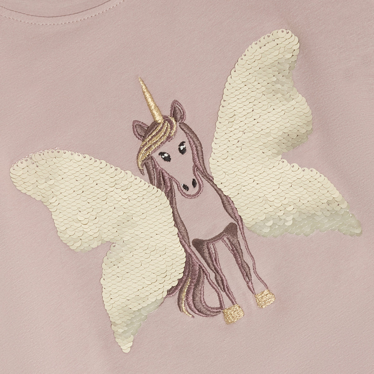 Langärmeliges T-Shirt von Minymo mit fliegendem Einhorn-Motiv und glitzernden Pailletten-Flügeln. Weiches, elastisches Material aus 95% Baumwolle und 5% Elastane für optimalen Tragekomfort.
