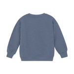 Dieses blaue Sweatshirt von MINYMO besticht durch ein niedliches Froschmotiv und sorgt für angenehmen Tragekomfort.