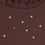 Hochwertiges Langarm-Shirt aus weichem Rippstoff mit funkelnden Glitzersteinen – ein verspieltes Highlight für jeden Tag.