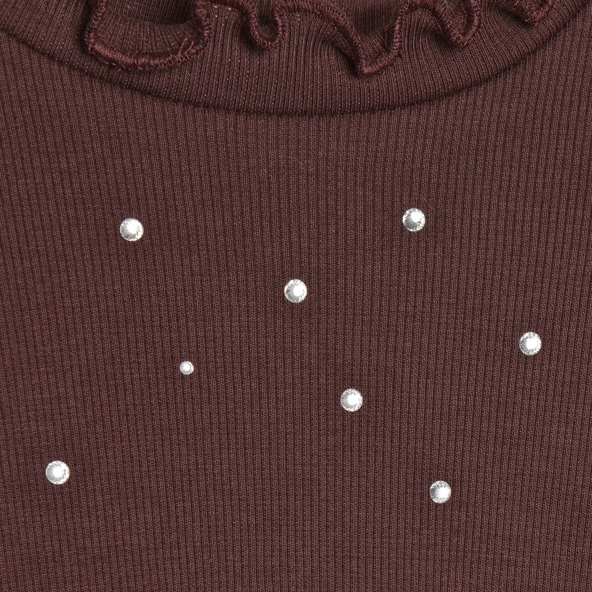 Hochwertiges Langarm-Shirt aus weichem Rippstoff mit funkelnden Glitzersteinen – ein verspieltes Highlight für jeden Tag.