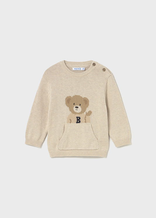 Dieser beigefarbene Pullover von Mayoral besticht durch ein niedliches Bärenmotiv und sorgt für ein charmantes, kindgerechtes Design.