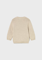 Dieser beigefarbene Pullover von Mayoral besticht durch ein niedliches Bärenmotiv und sorgt für ein charmantes, kindgerechtes Design.